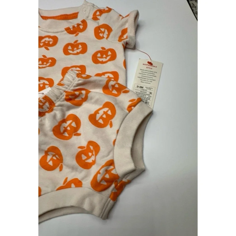 NEW infant size 0-3 months off white and pumpkin orange two piece outfit. Unisex